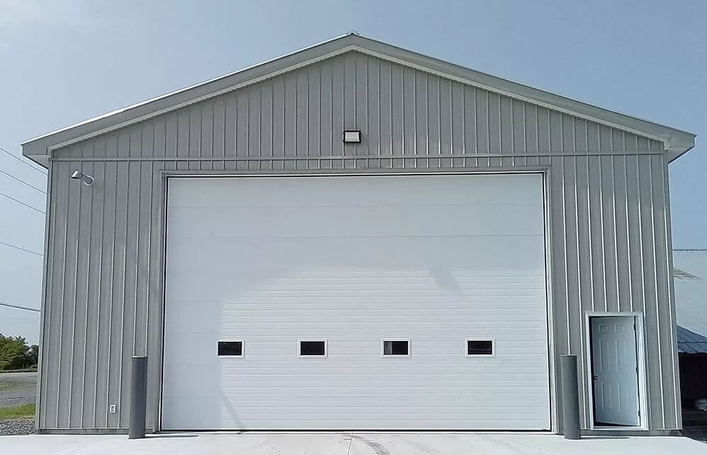 G-5000 Garaga made in Canada huge agricultural steal overhead garage door for a farm machinery storage building in Metcalfe